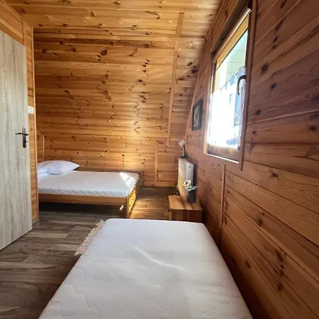 Деревянный коттедж Teo Pietrowe I Parterowe Реваль