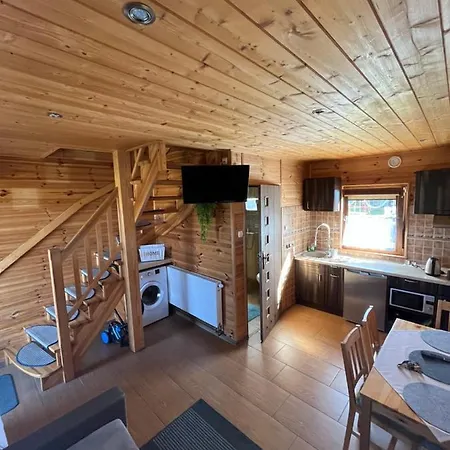 Деревянный коттедж Teo Pietrowe I Parterowe Реваль